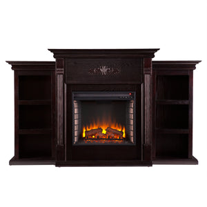 Handsome bookcase fireplace with striking woodwork details Image 3