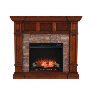 Corner-convertible electric fireplace with faux stone surround Image 3