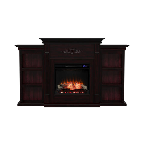 Image of Handsome bookcase fireplace with striking woodwork details Image 3