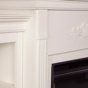 Handsome bookcase fireplace with striking woodwork details Image 8