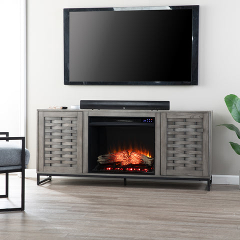 Image of Gray TV stand with electric fireplace Image 1