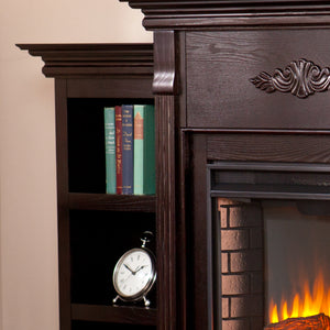 Handsome bookcase fireplace with striking woodwork details Image 10