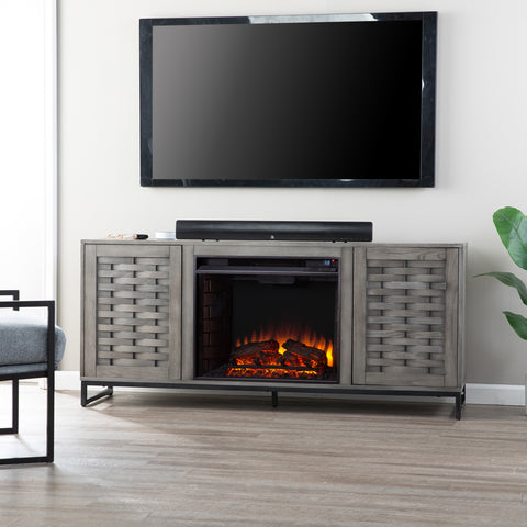Image of Gray TV stand with electric fireplace Image 1