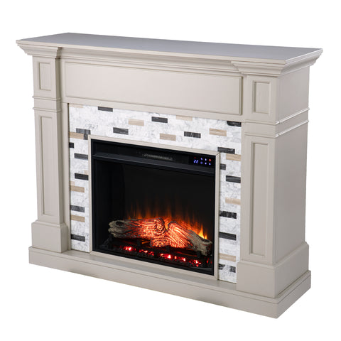 Image of Classic electric fireplace with multicolor marble surround Image 4