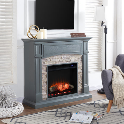 Image of Electric fireplace w/ faux stone surround Image 3