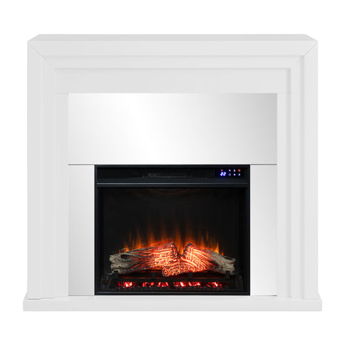 Image of Mixed material fireplace mantel w/ mirrored surround Image 3