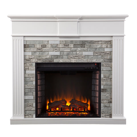 Image of Classic electric fireplace w/ modern faux stone surround Image 3