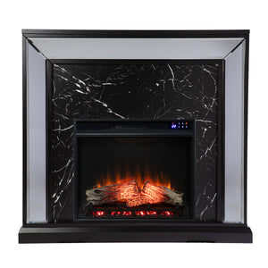 Elegant mirrored fireplace mantel w/ faux stone surround Image 2