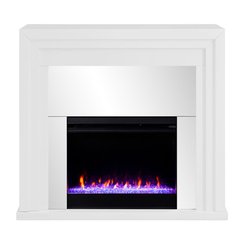 Image of Mixed material fireplace mantel w/ mirrored surround Image 4