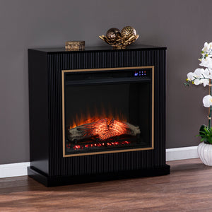 Modern electric fireplace w/ gold trim Image 1
