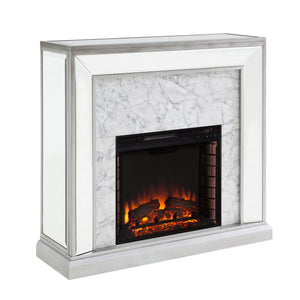 Elegant mirrored fireplace mantel w/ faux stone surround Image 4