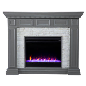 Electric fireplace w/ color changing flames and faux stone surround Image 4
