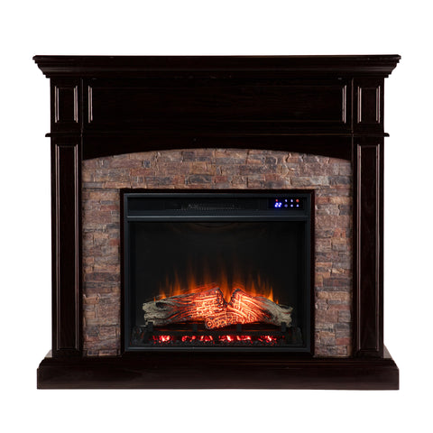 Image of Corner convertible fireplace w/ faux stone surround Image 4