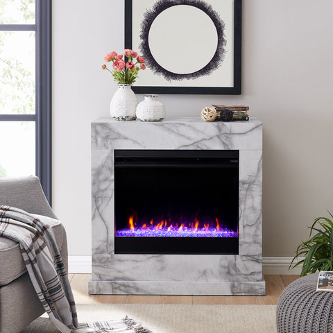Image of Faux marble fireplace mantel w/ color changing firebox Image 1