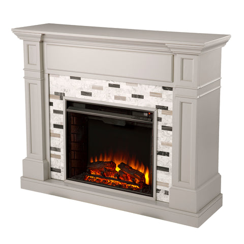 Image of Classic electric fireplace with multicolor marble surround Image 4