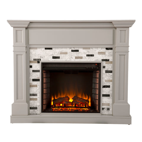 Image of Classic electric fireplace with multicolor marble surround Image 3