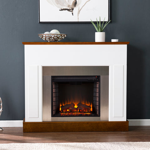 Image of Sleek electric fireplace with metallic surround Image 1