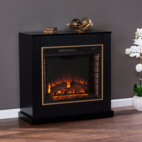 Image of Modern electric fireplace w/ gold trim Image 1