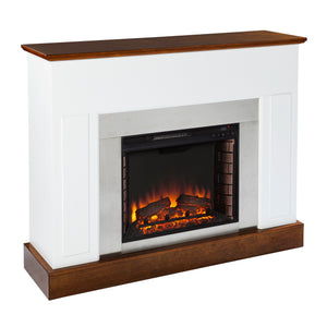 Sleek electric fireplace with metallic surround Image 3