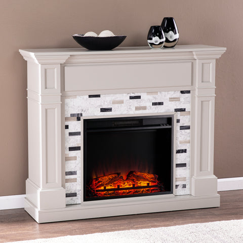 Image of Classic electric fireplace with multicolor marble surround Image 2
