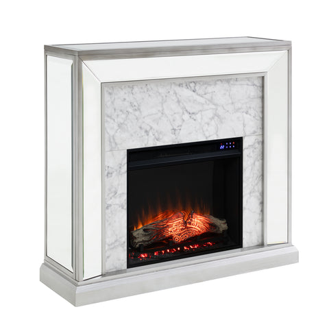 Image of Elegant mirrored fireplace mantel w/ faux stone surround Image 4